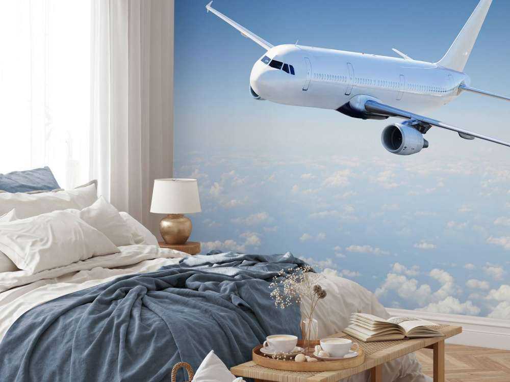 Aereo sopra le nuvole