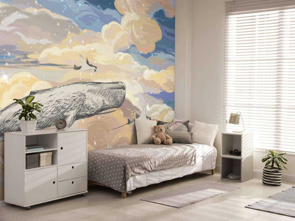 Balena che nuota tra le nuvole