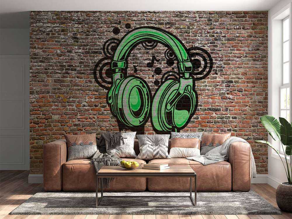 Graffiti su un vecchio muro di mattoni