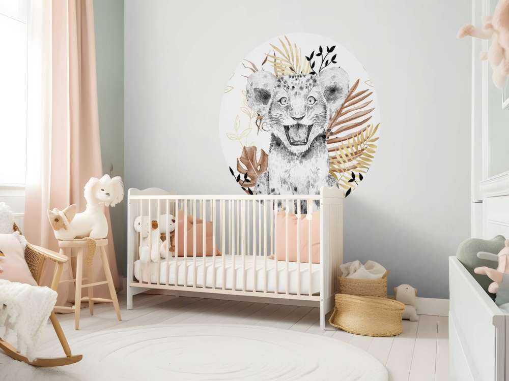 Cucciolo di leone marrone e con foglie d'oro