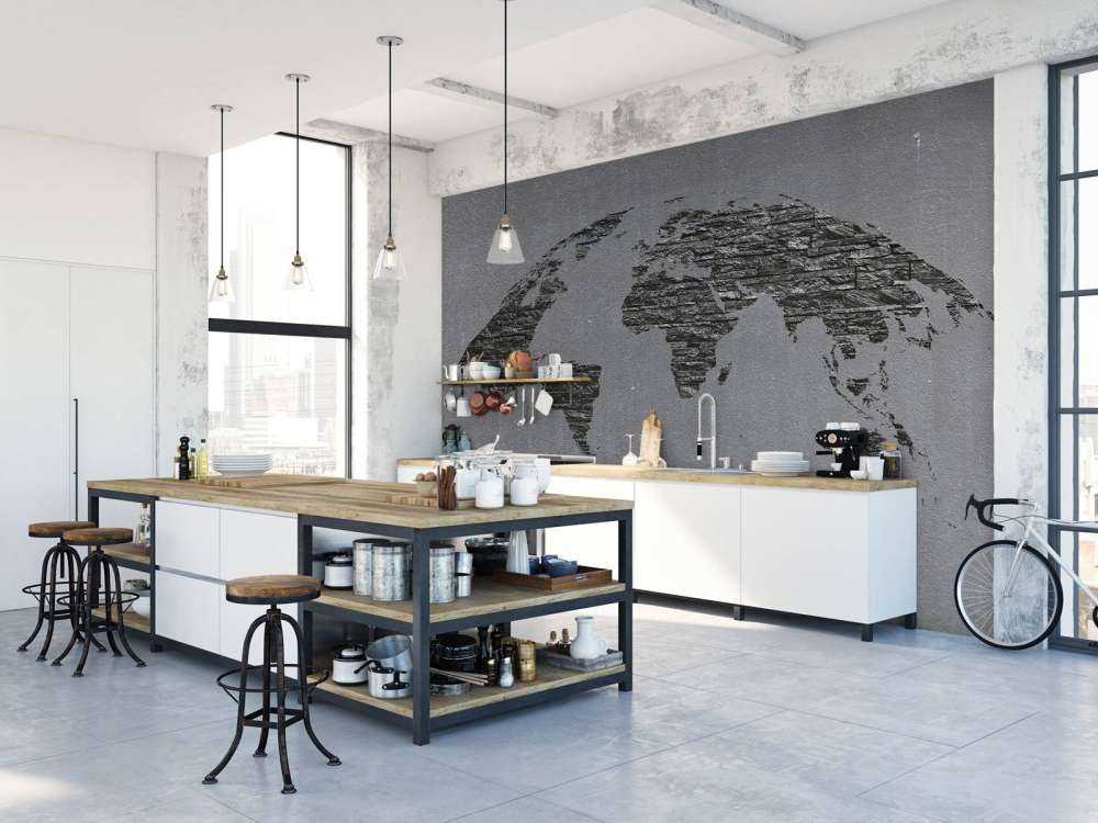 Pietre della mappa del mondo su cemento grigio