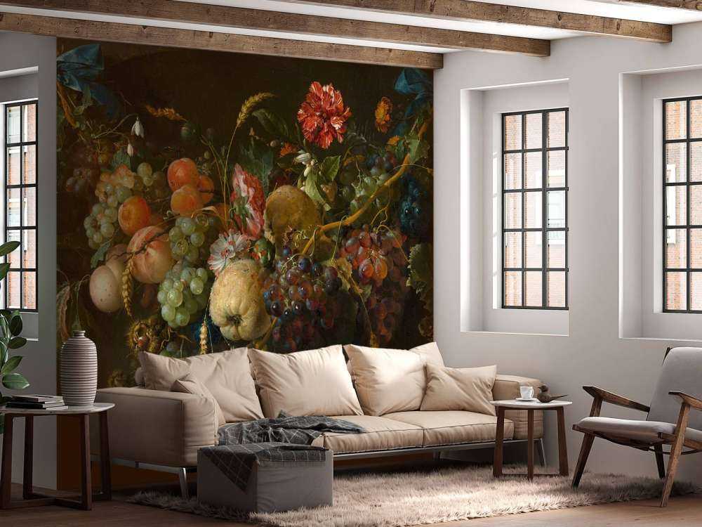 Ghirlanda di frutta con qualche fiore