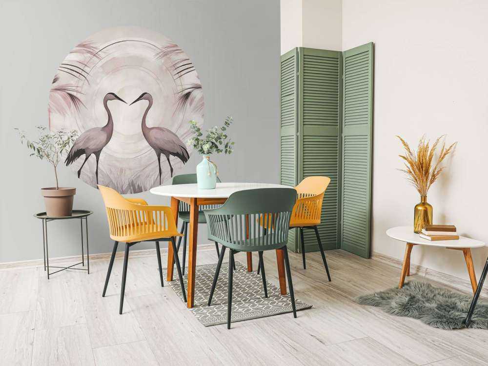 Gru al tramonto rosa