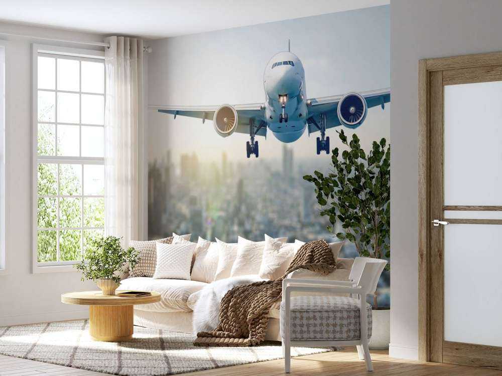 Aereo in discesa sopra una città