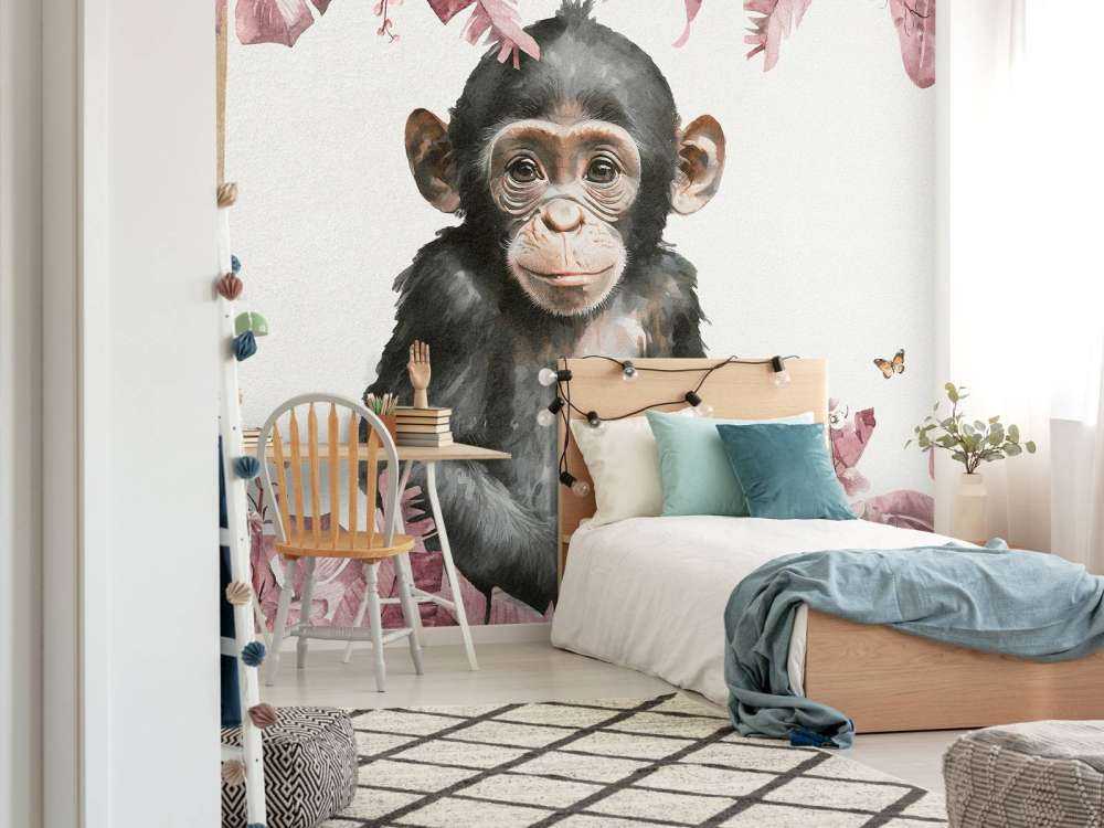 Baby scimpanzé nella giungla rosa