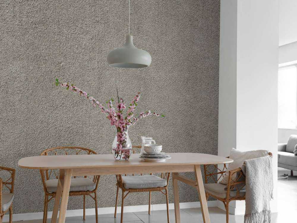 Parete in calcestruzzo con pietre fini