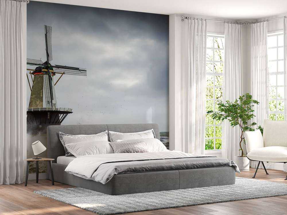 Mulino con onde di tempesta