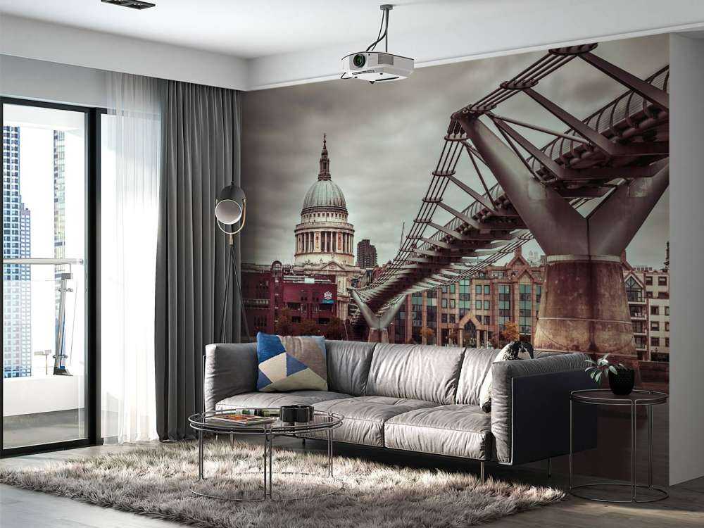 View of St Paul's Cathedral and Millennium Bridge from river thames, London, UK