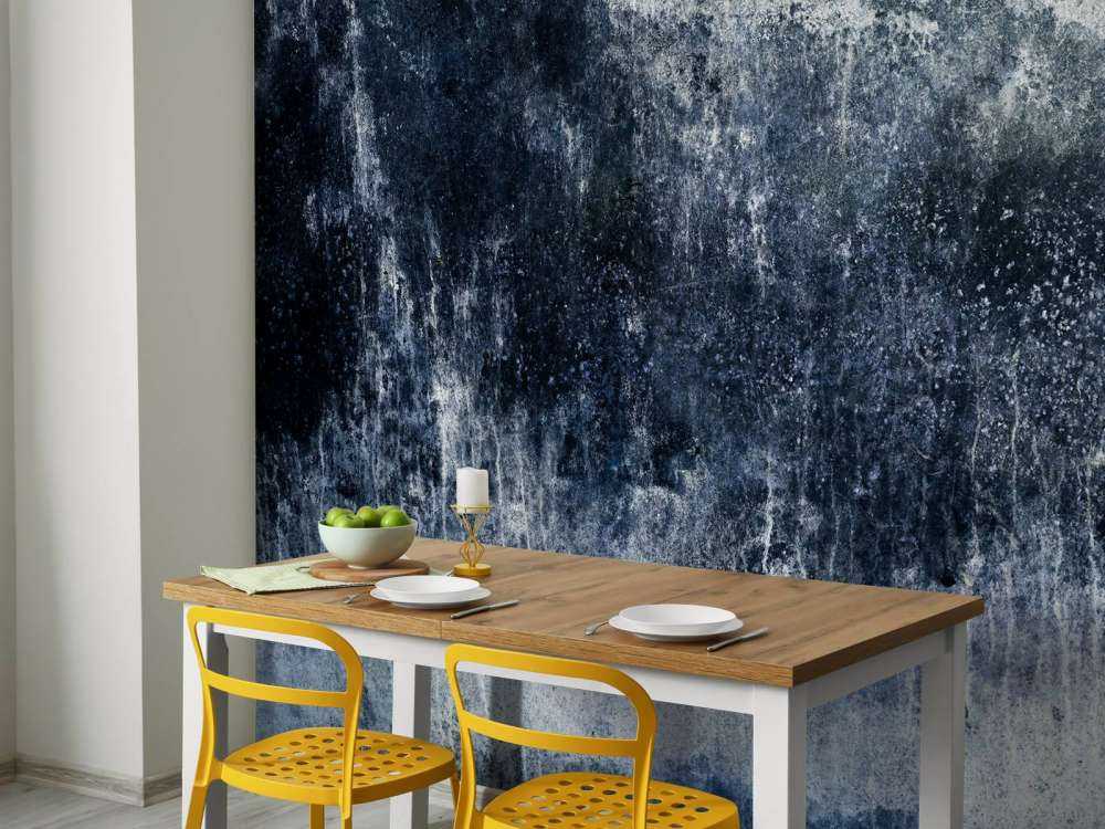 Vecchia parete blu alle intemperie