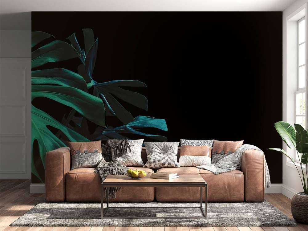 Foglie tropicali su sfondo nero