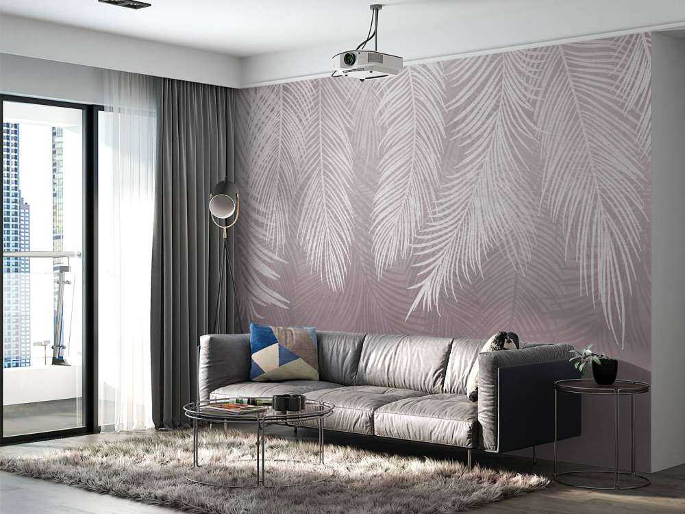 Hojas de palmera sobre hormigón