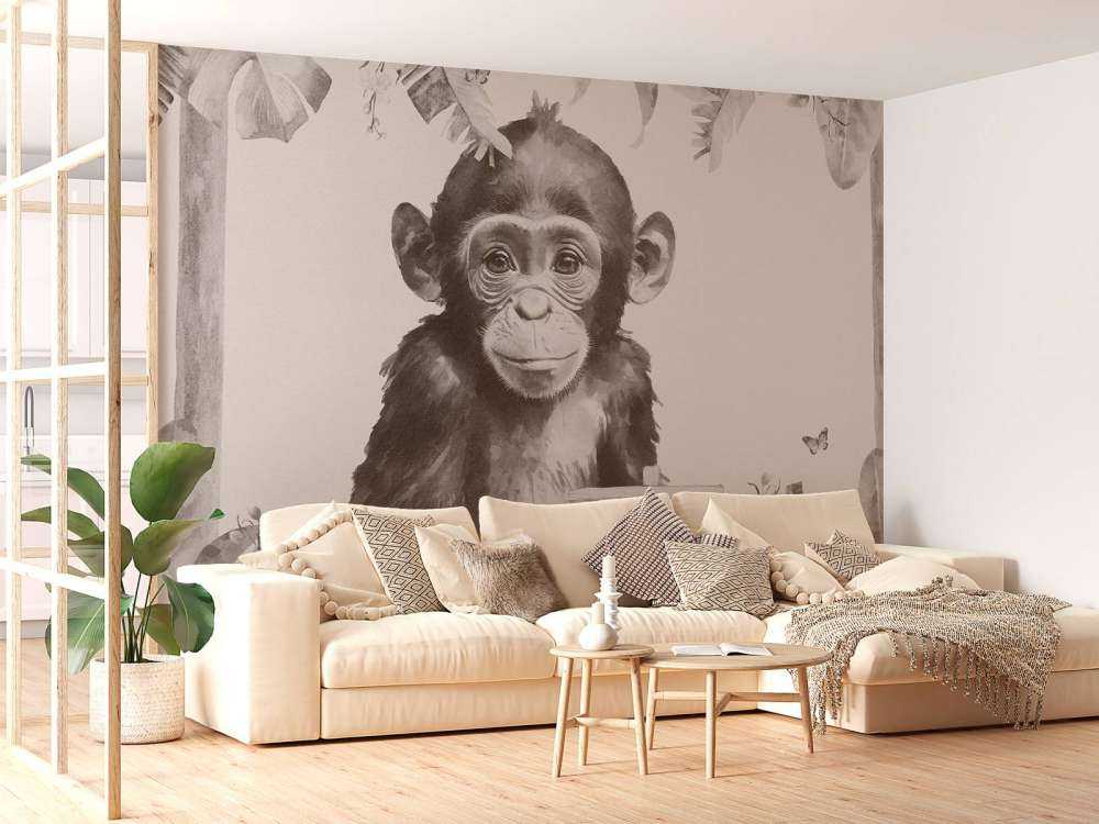 Baby scimpanzé nella giungla beige