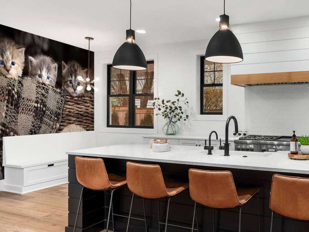 Tre gattini in un cestino