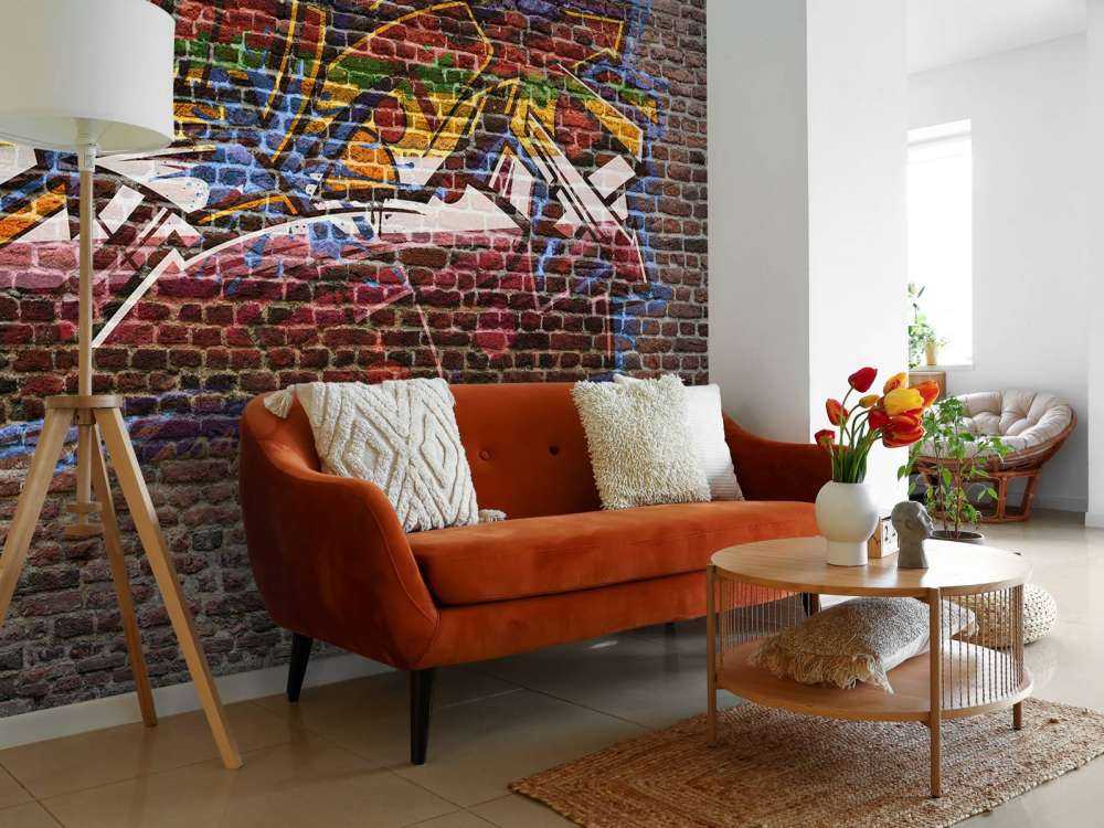 Graffiti su muro di mattoni