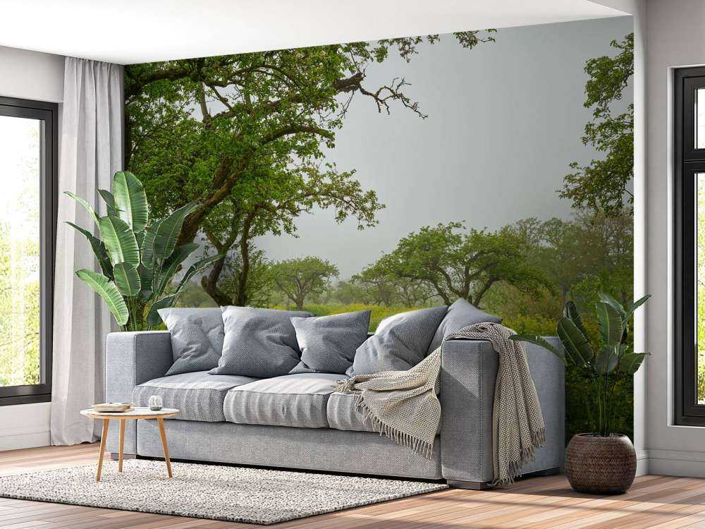 Sentiero attraverso colline con fiori gialli