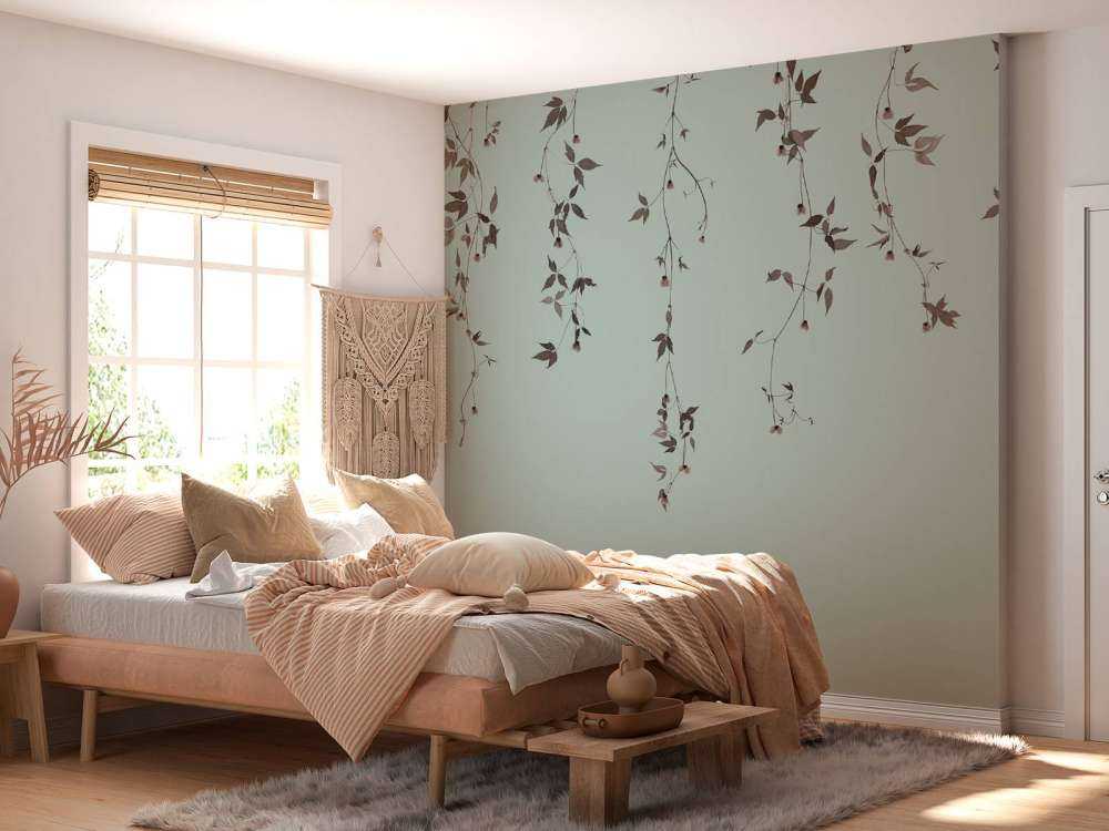 Rametti di clematide su grigio verde