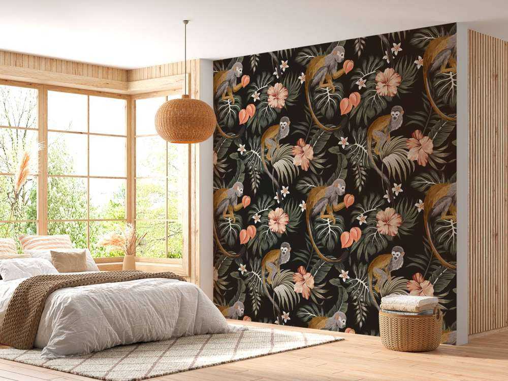 Foglie tropicali con le scimmie