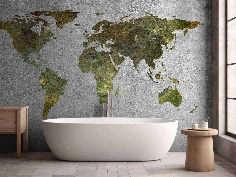 Mappa del mondo con struttura verde su cemento grigio
