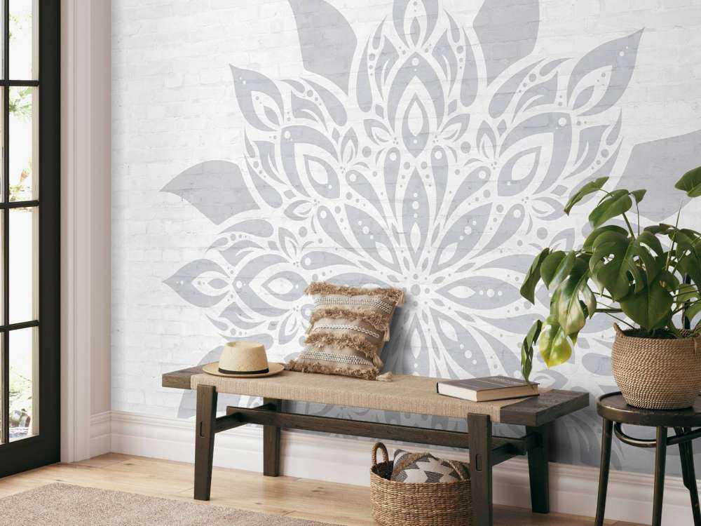 Mandala grigio chiaro su mattone