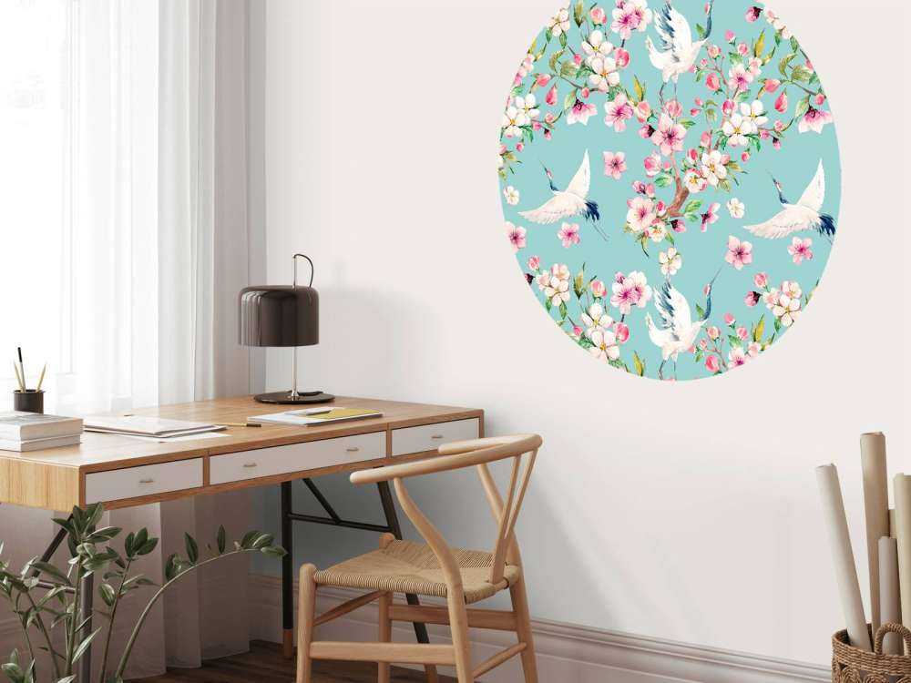 Gru tra i fiori rosa