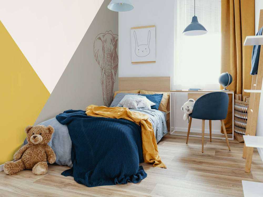 Triangoli in giallo ocra e verde ocra con elefante