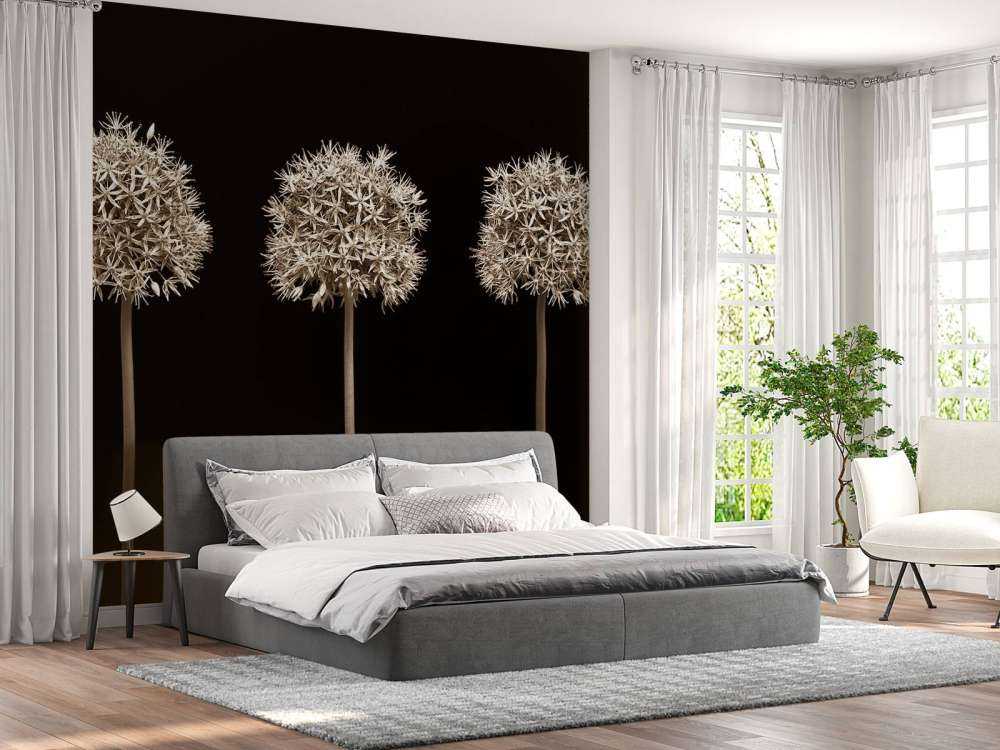 Tre fiori di allium in fila