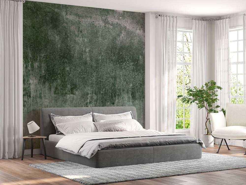 Vecchia parete verde alle intemperie