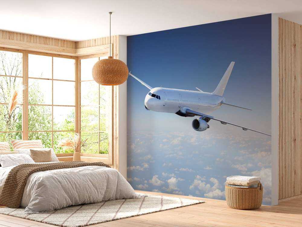 Aereo sopra le nuvole